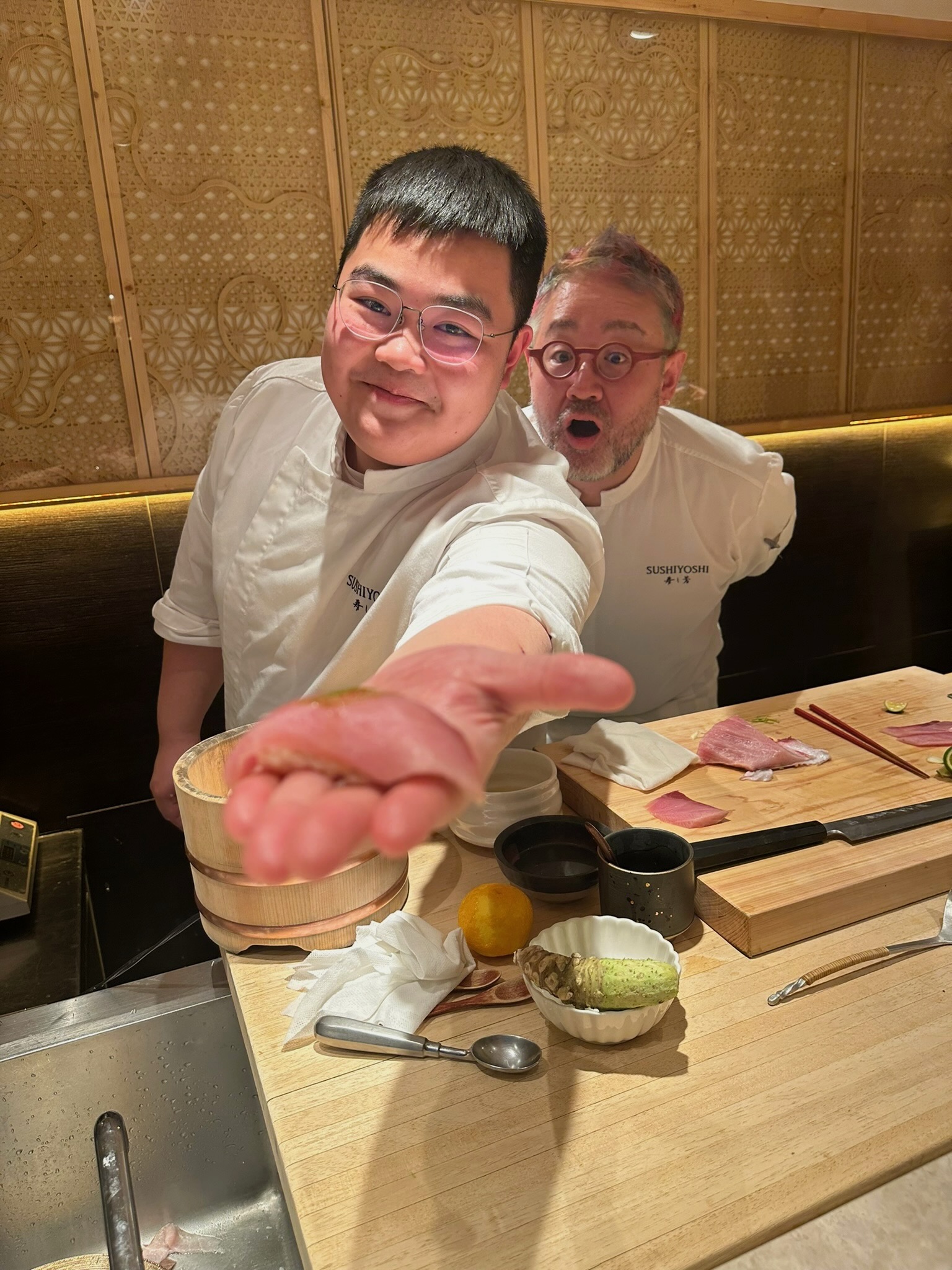 Sushi chefs at the counter